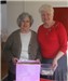 Village hall committee members Mary Hudson, secretary, and Val Wiley at the tombola stall.