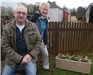 Ian Lamble and Sheila Cadman admire one of the new planters.